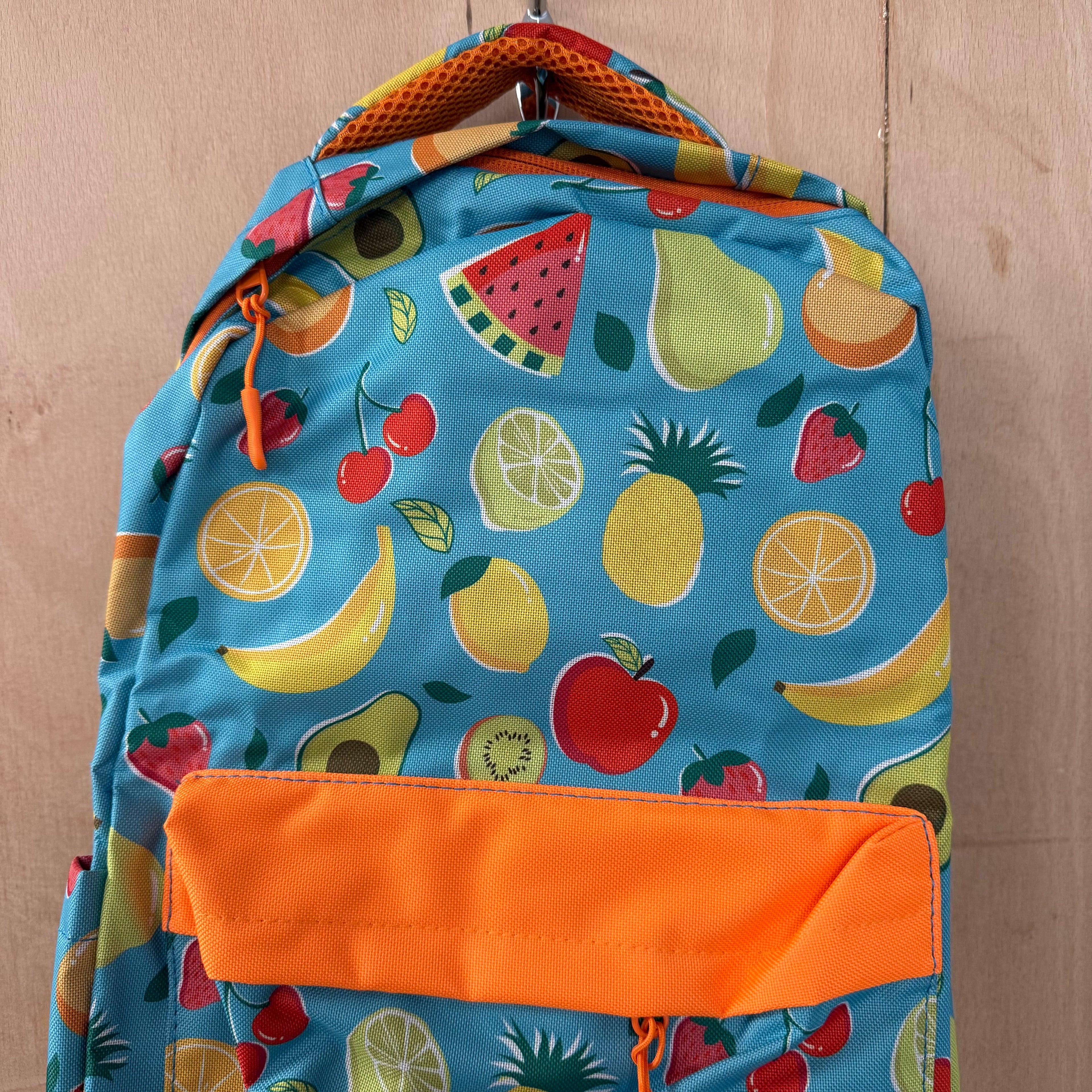 Snug children's backpack for school with fruit pattern
