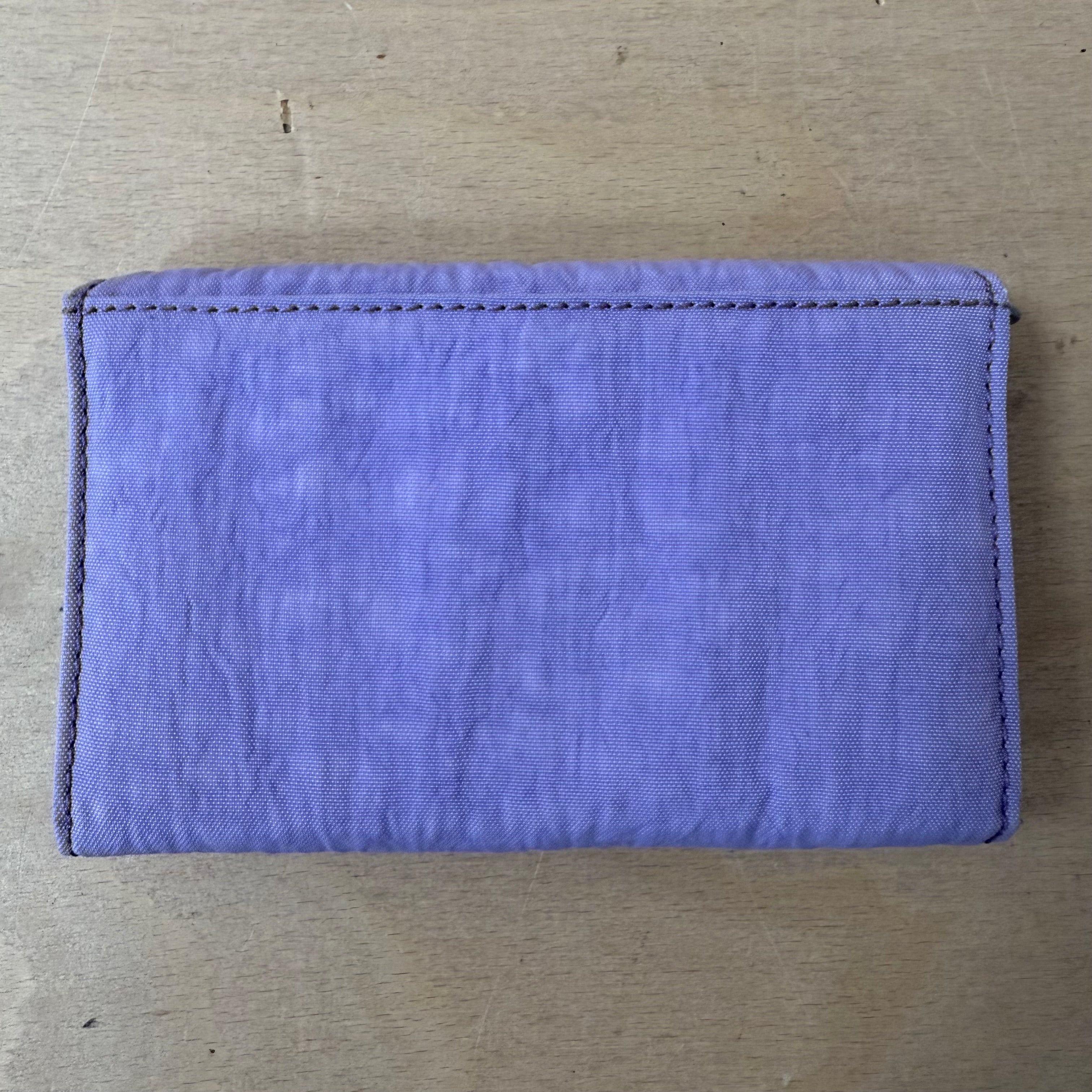Kipling lilac purse with popper closure