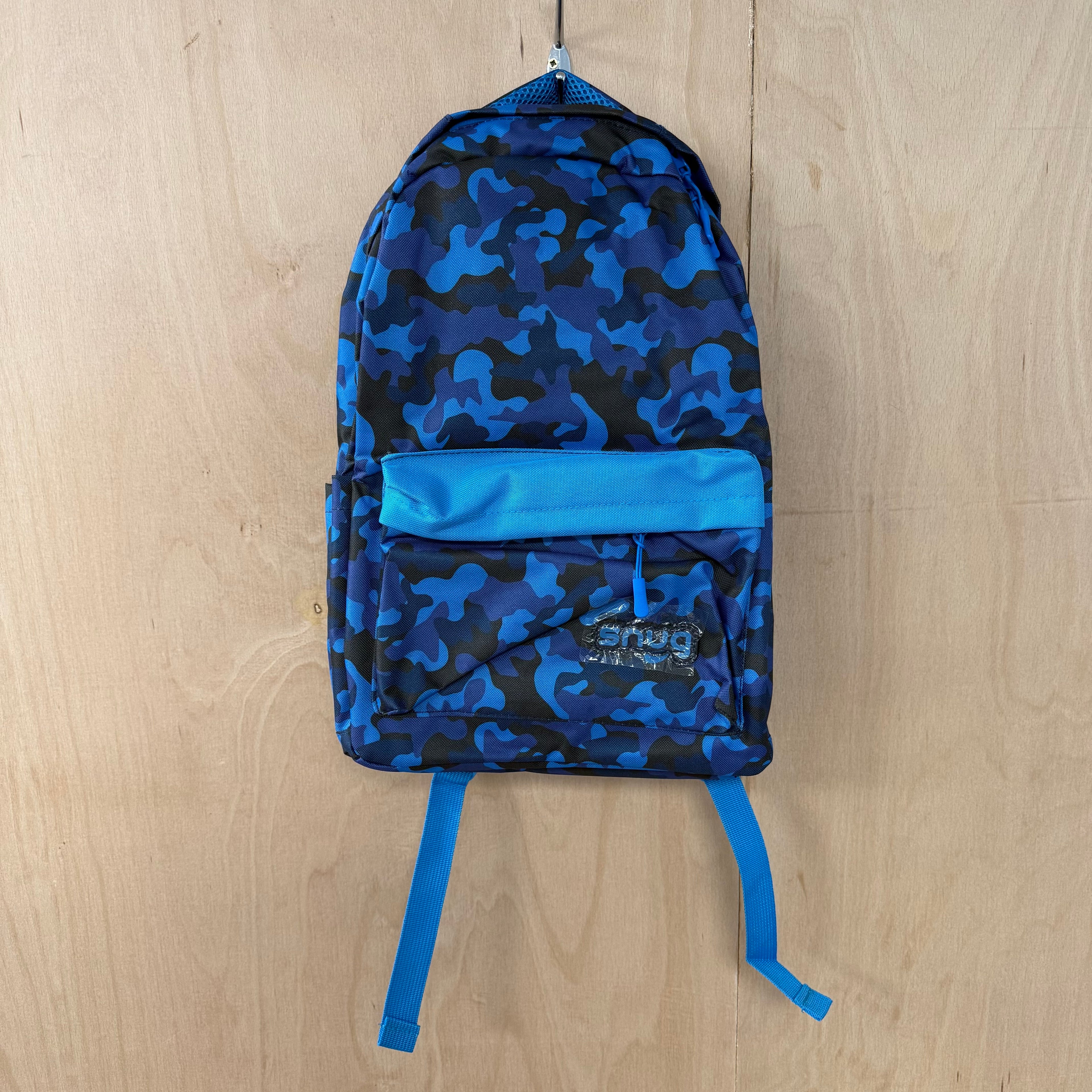 Snug children's backpack for school with camo pattern