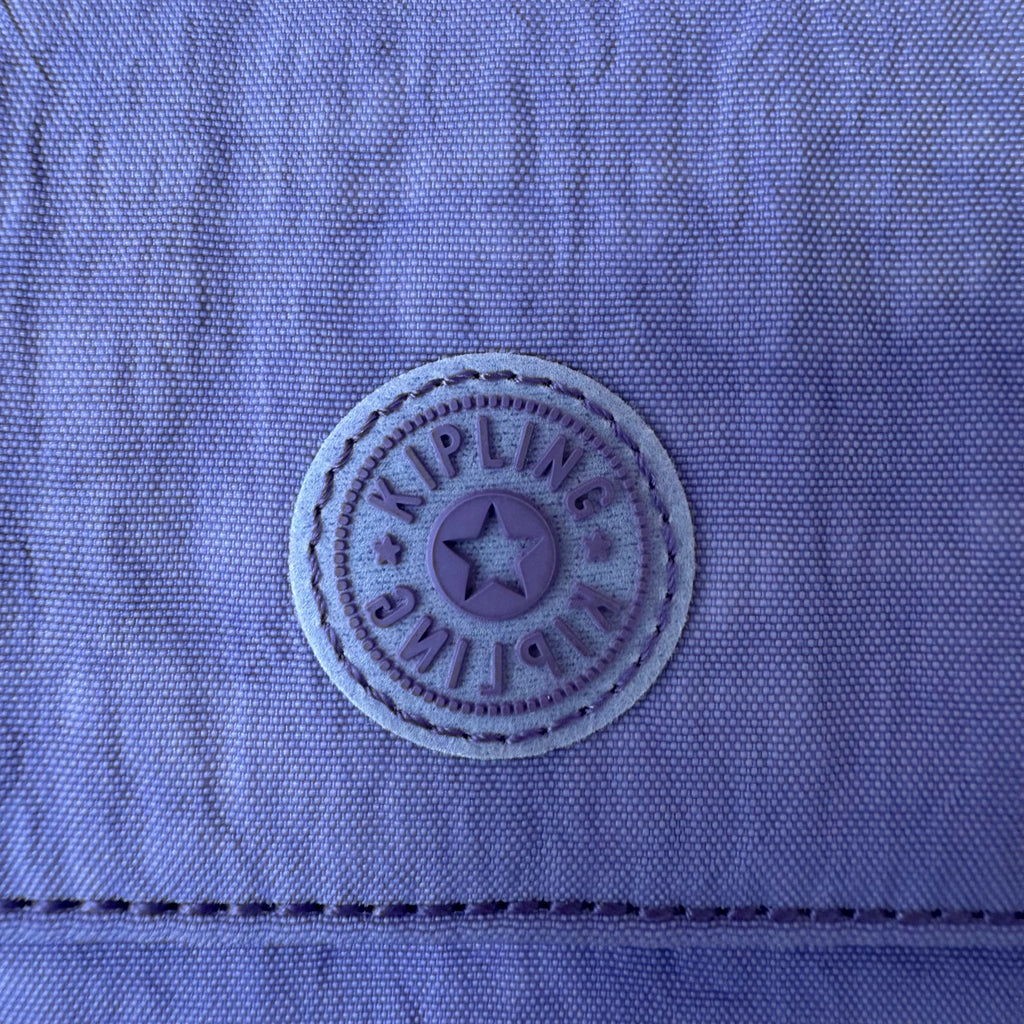 Kipling lilac purse with popper closure