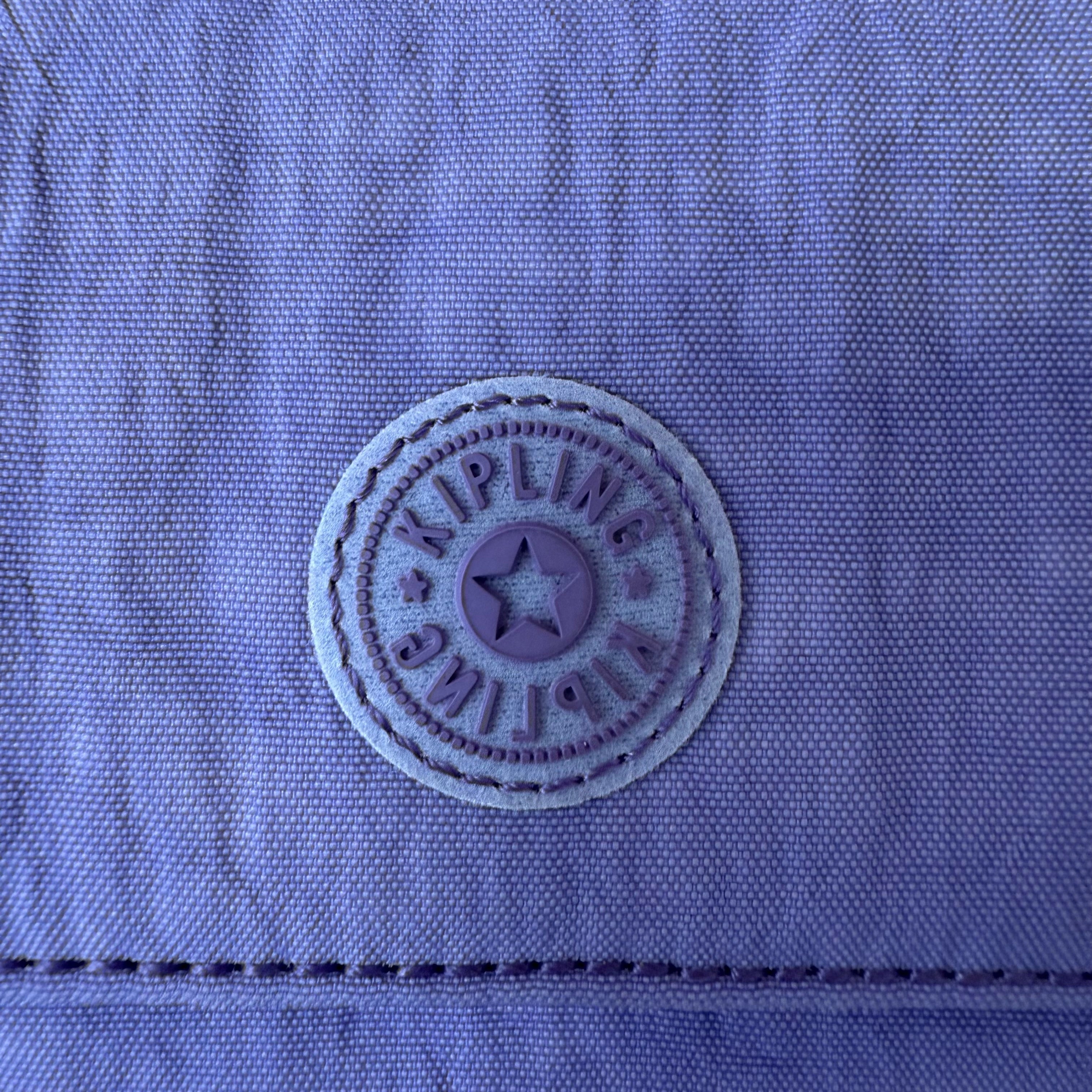 Kipling lilac purse with popper closure