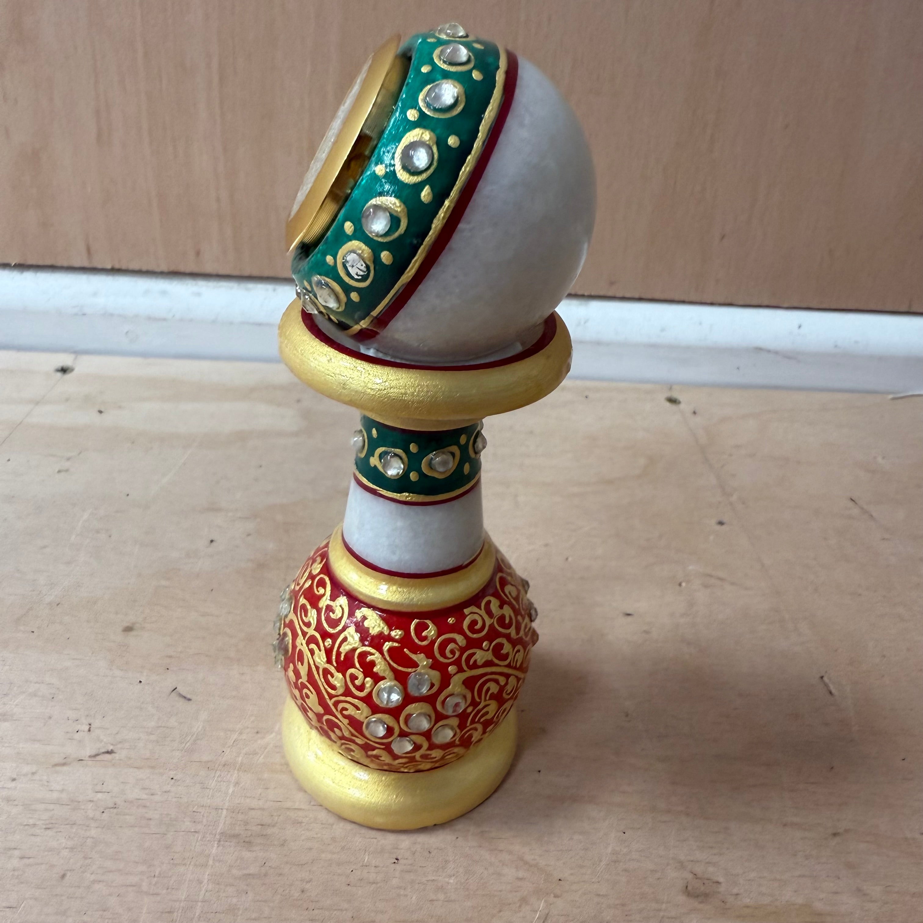 Meenakari white pillar watch with green, gold and red decoration