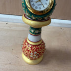 Meenakari white pillar watch with green, gold and red decoration