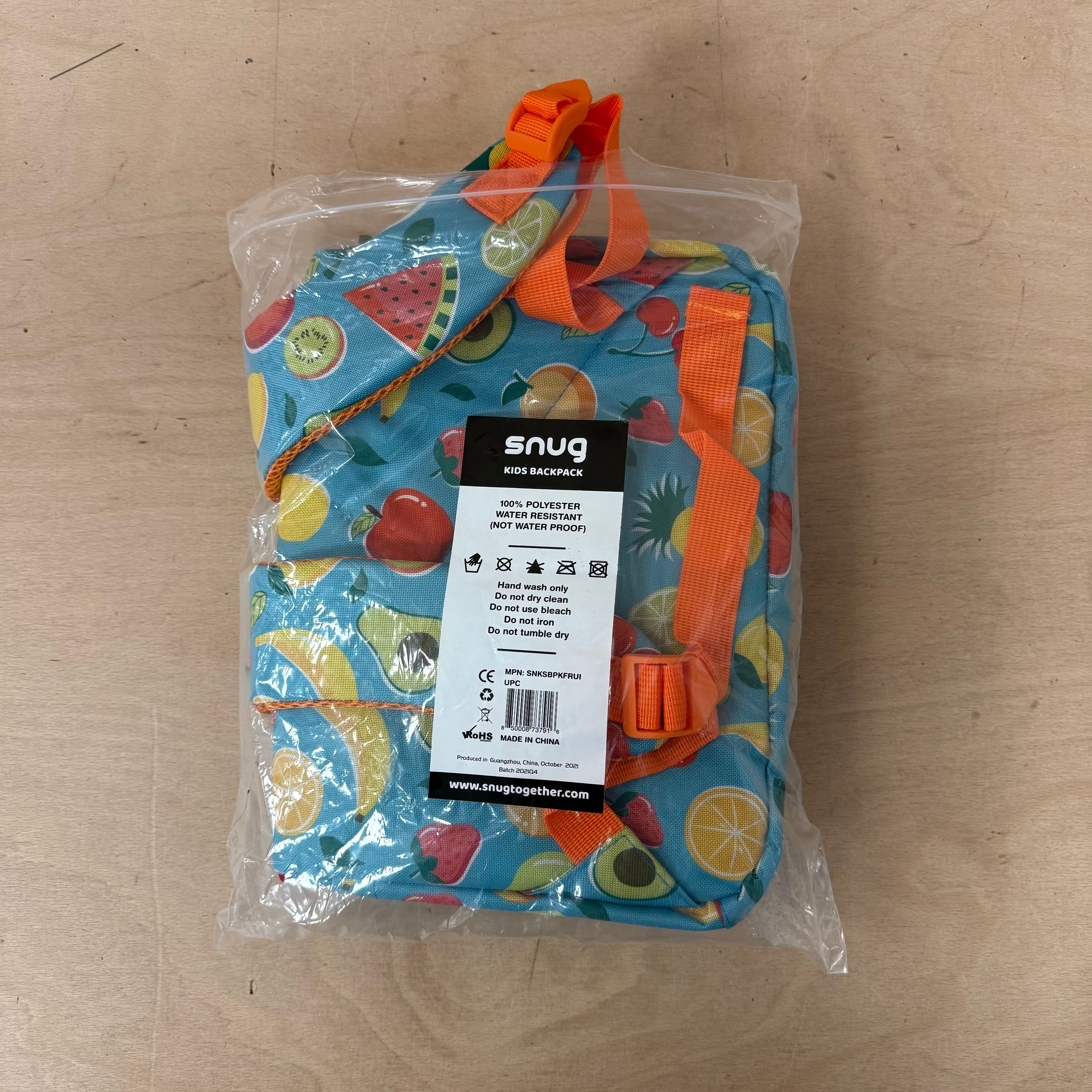 Snug children's backpack for school with fruit pattern