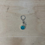 Demelza branded trolley token