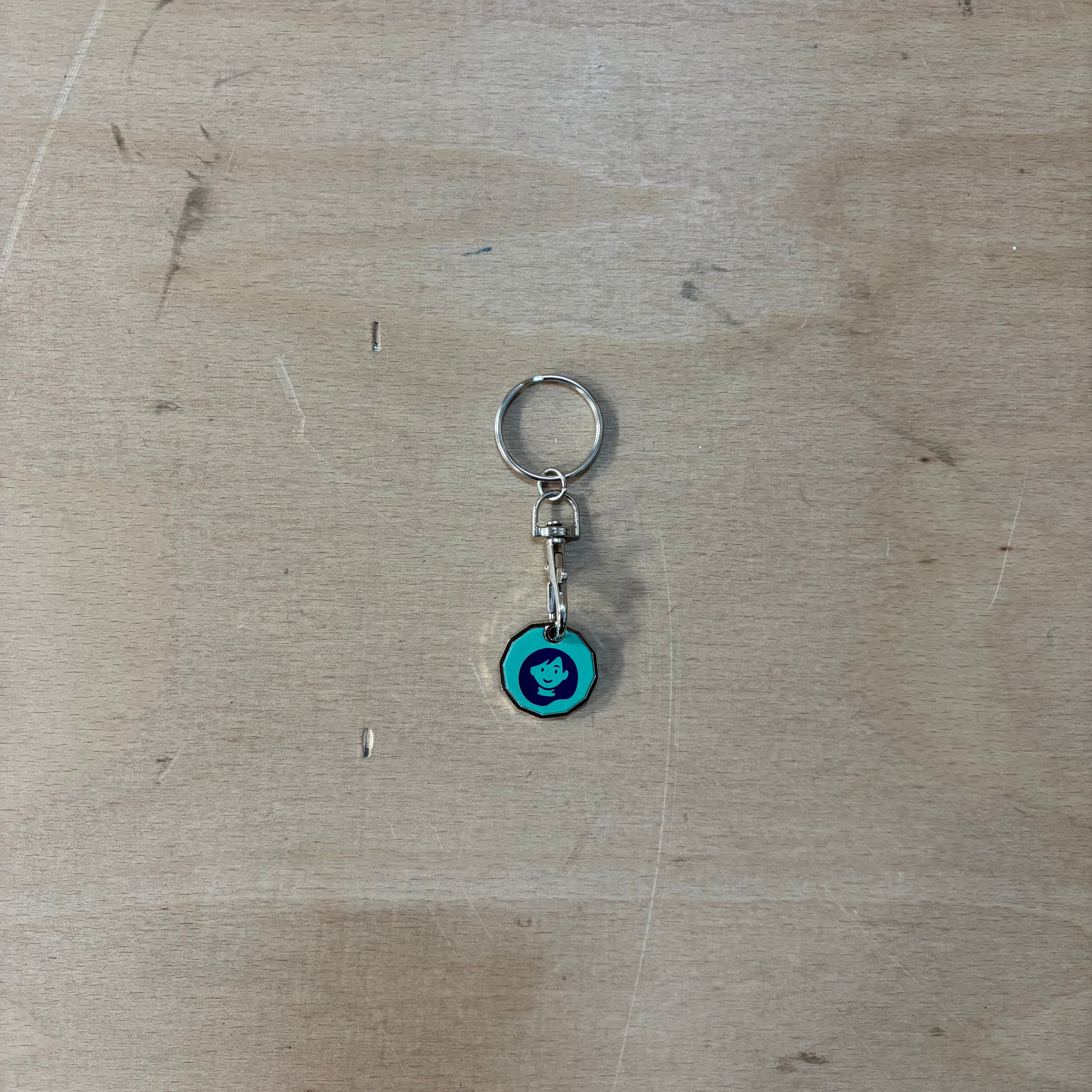 Demelza branded trolley token