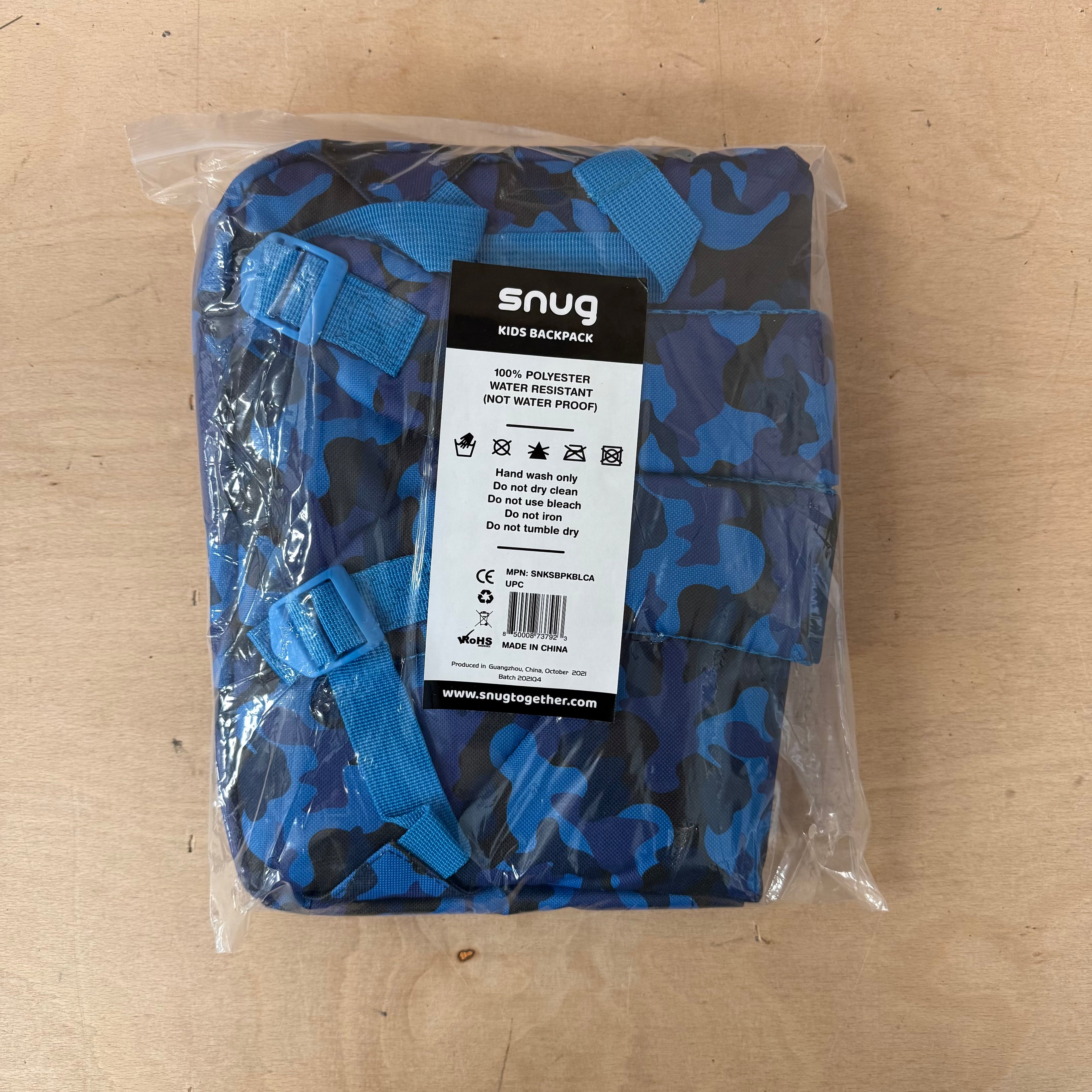 Snug children's backpack for school with camo pattern