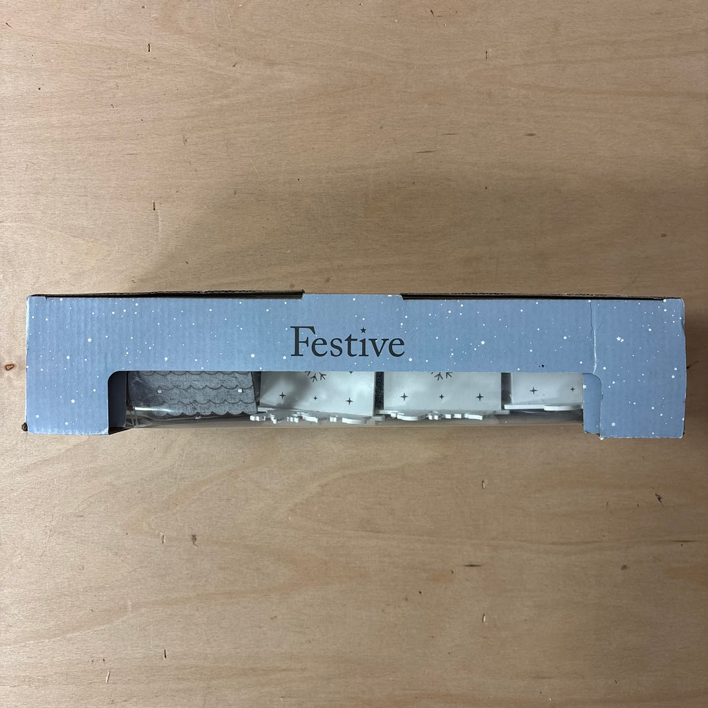 Festive lit wooden santa train