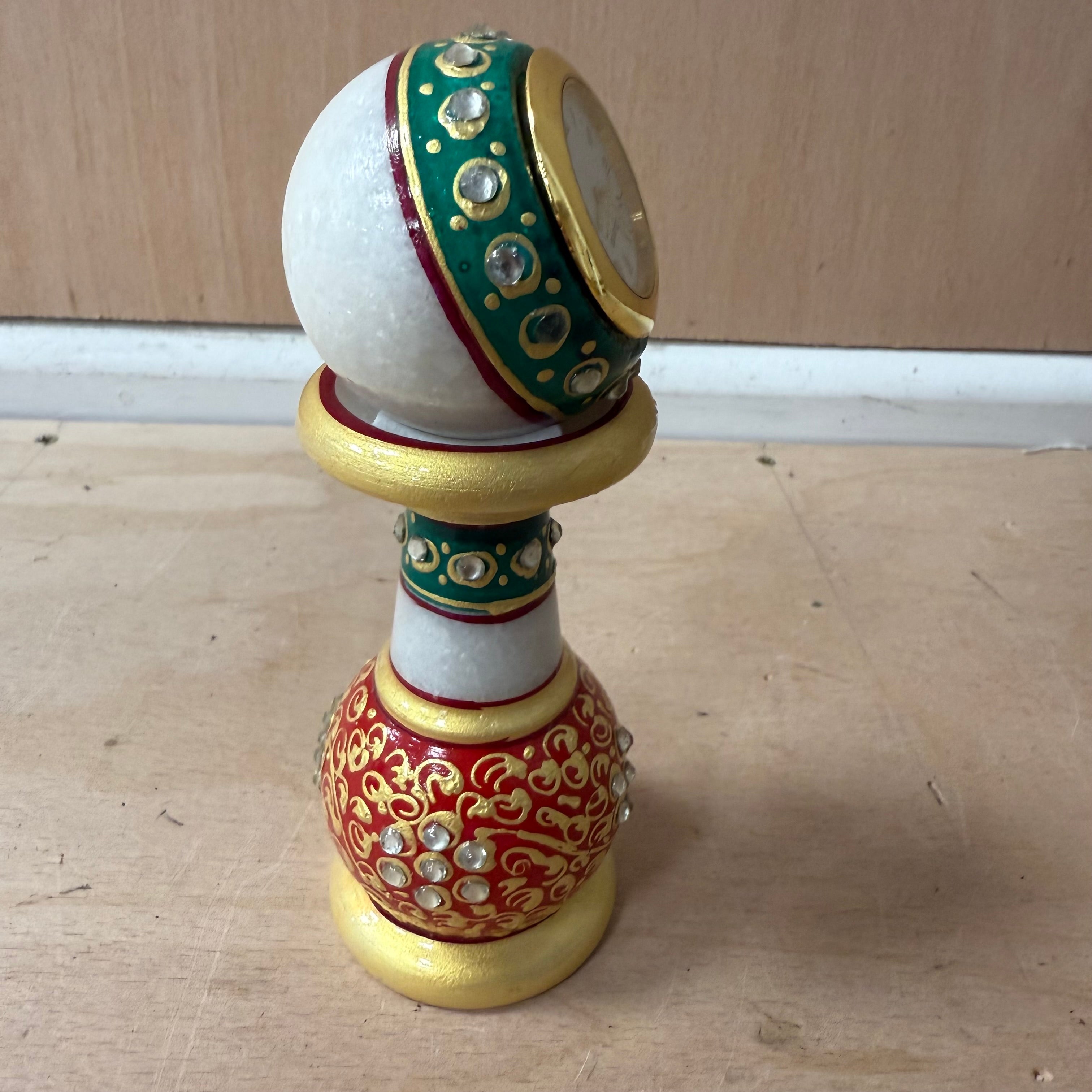 Meenakari white pillar watch with green, gold and red decoration