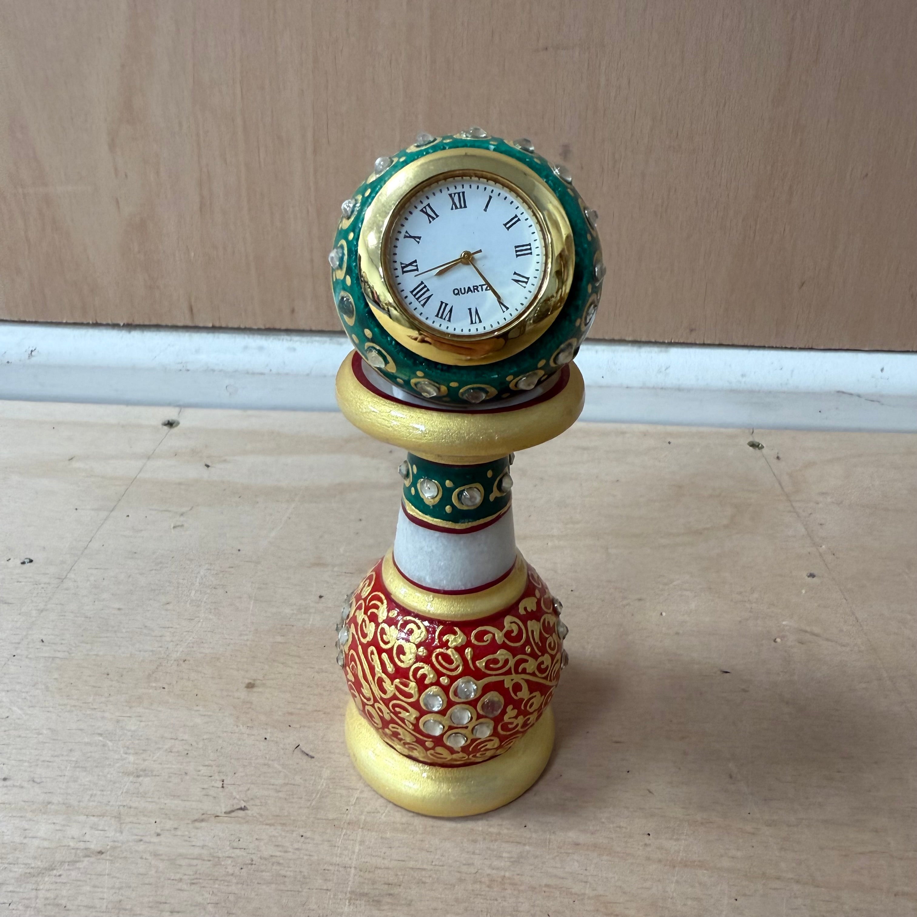 Meenakari white pillar watch with green, gold and red decoration