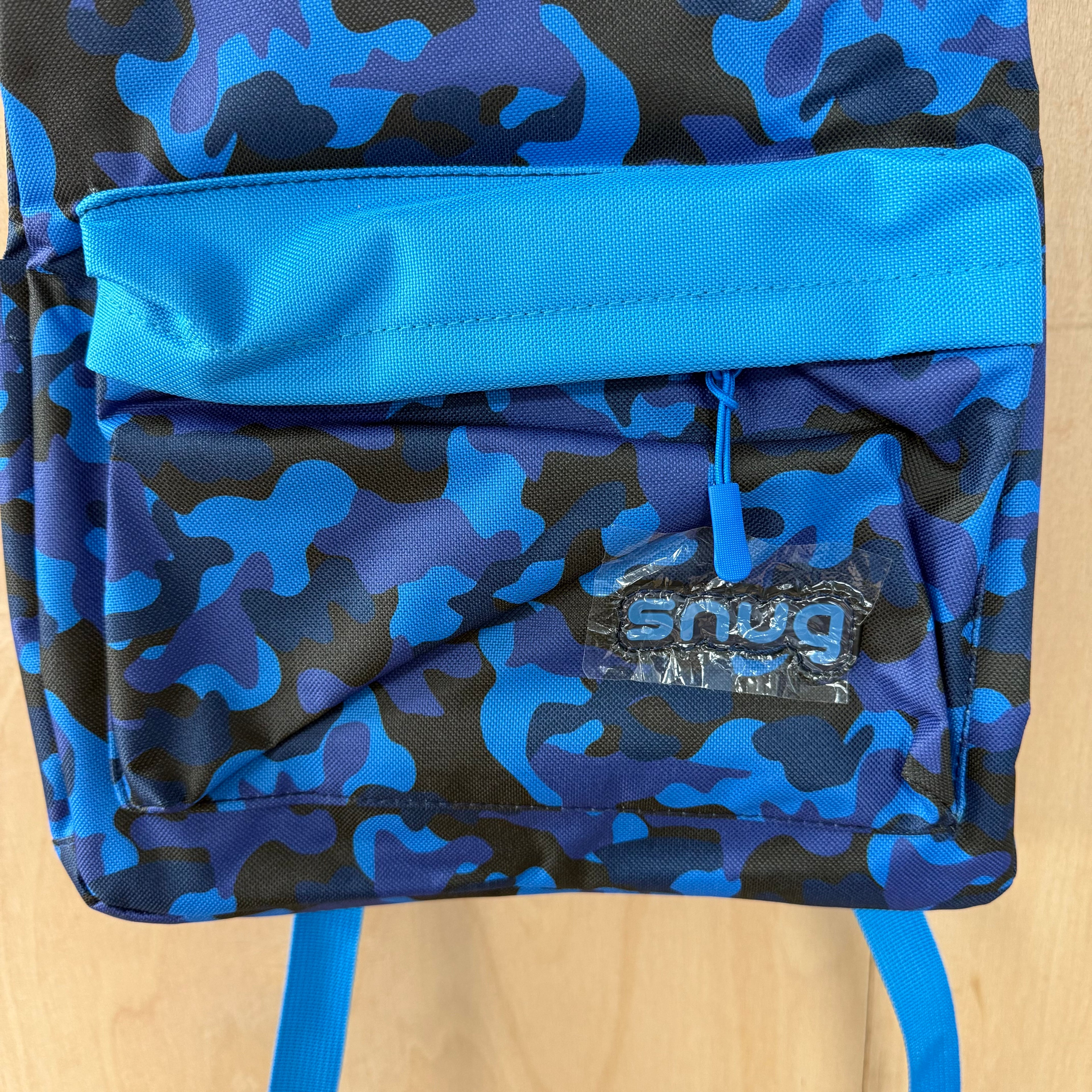 Snug children's backpack for school with camo pattern