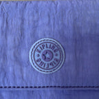 Kipling lilac purse with popper closure