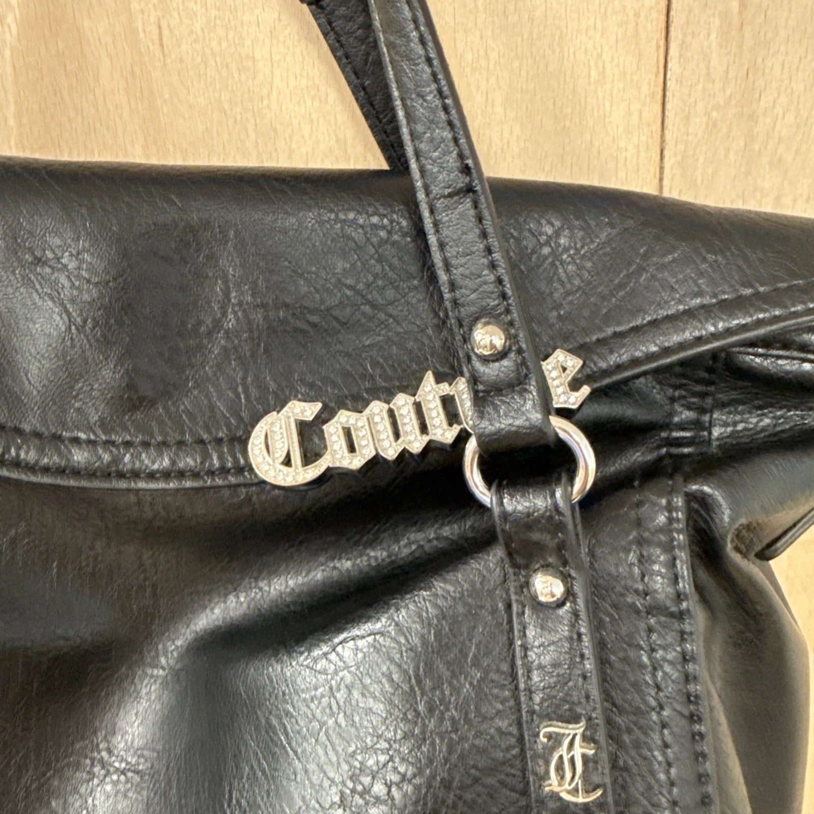 Juicy couture black faux leather designer handbag